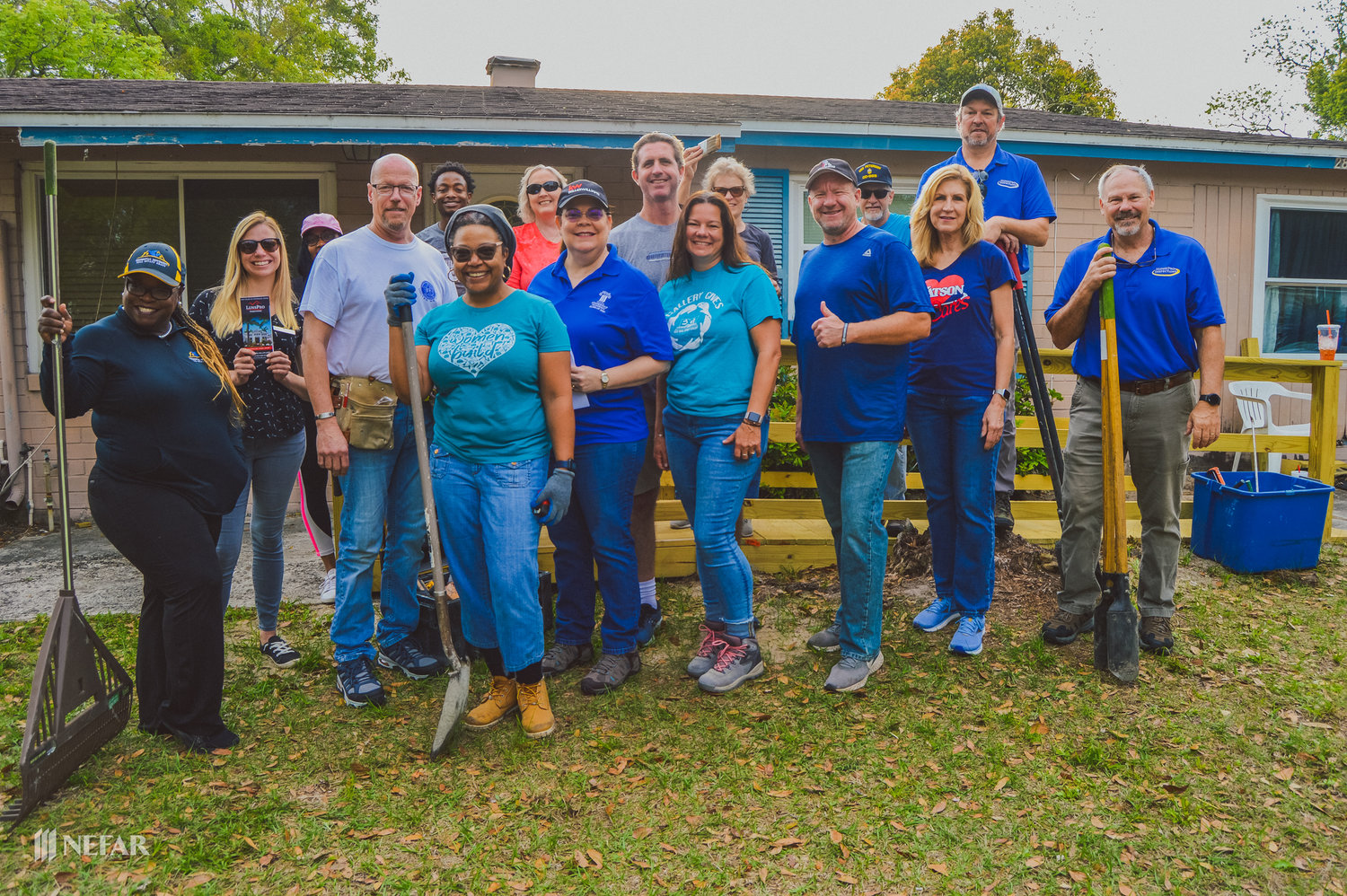 Members of Northeast Florida Association of Realtors turned out to build two decks and wheelchair access ramps at the Southside home of an amputee and his disabled wife on March 23.